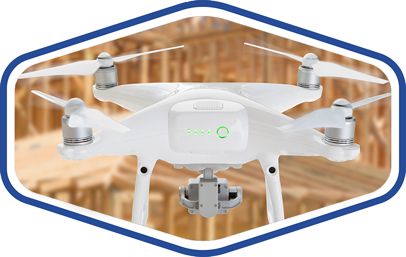 Image of a drone in front of a house being constructed