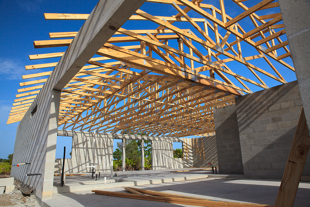 New Home Construction, Cement block walls wooden roof trusses viewed from outside